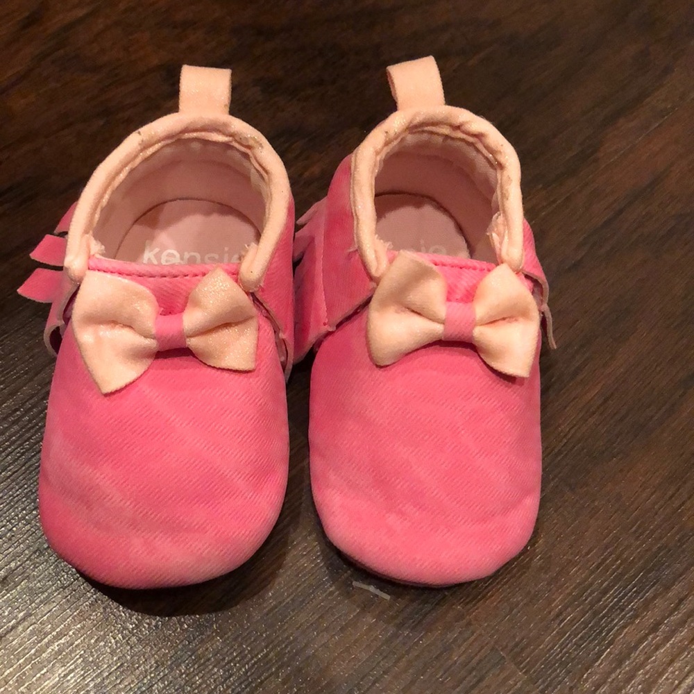Pink moccasin style kid shoes